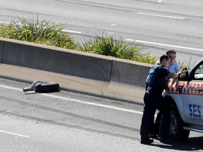 An aircraft wheel lies on the Tullamarine Freeway. AAP Image