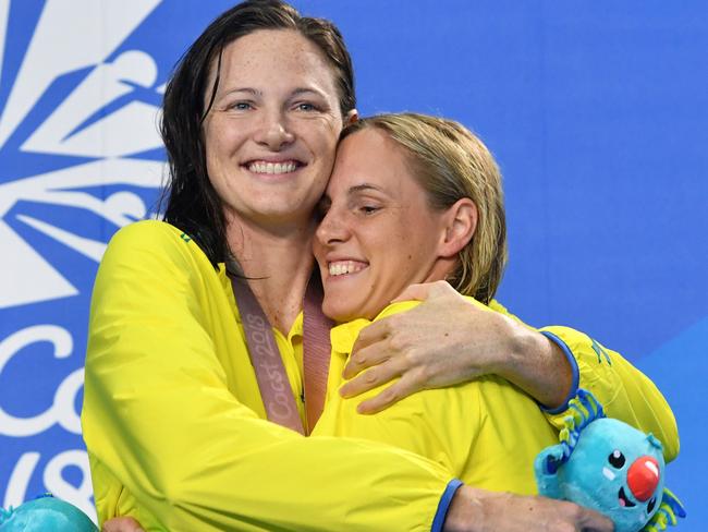 Bronte Campbell with sister Cate during the women’s 100m freestyle medal ceremony. Picture: AAP