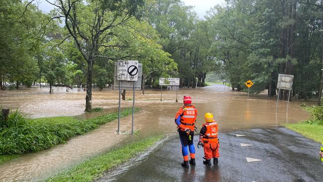 Paramedics worked closely with other emergency services to safely retrieve four men cut off by flood waters at Upper Orara on Thursday. Picture: NSW Ambulance