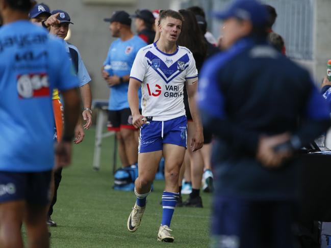 Mitchell Woods is marched to the sin bin. Picture: Warren Gannon Photography.