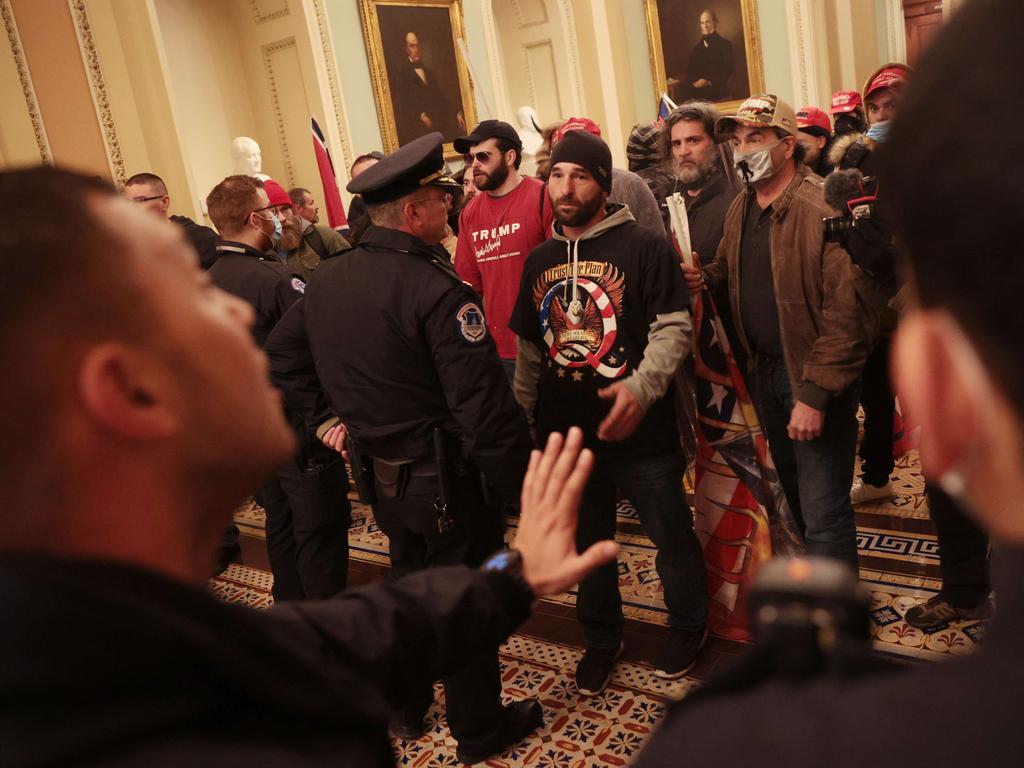 Protesters interact with Capitol Police inside the U.S. Capitol Building. Picture: Getty