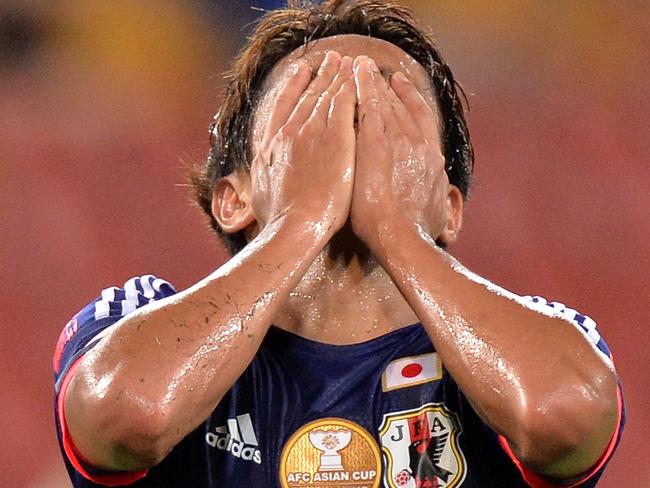 BRISBANE, AUSTRALIA - JANUARY 16: Hiroshi Kiyotake of Japan reacts after his shot at goal is unsuccessful during the 2015 Asian Cup match between Iraq and Japan at Suncorp Stadium on January 16, 2015 in Brisbane, Australia. (Photo by Bradley Kanaris/Getty Images)