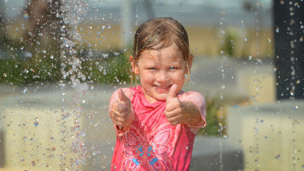 Aria Savage (5) finds relief from the hot weather at the Keppel Kraken water feature on the Yeppoon foreshore. FILE PHOTO.