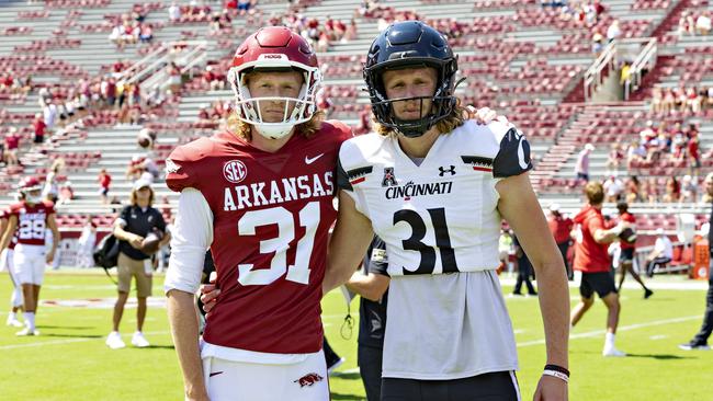 Dustin Fletcher’s sons Max (left) and Mason (right) both wear his famous number 31 in the NCAA. Picture: Wesley Hitt