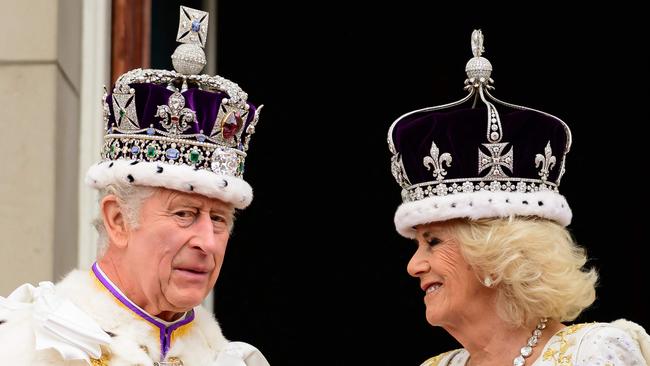 Britain's King Charles III and Queen Camilla stand on the Buckingham Palace balcony, in London. The only place that he appears reluctant to use is the one associated with the royal family around the world. Picture: AFP