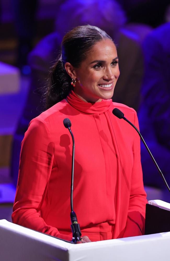 The Duchess of Sussex made a bold statement with her own red power suit last September in Manchester. Picture: Getty Images