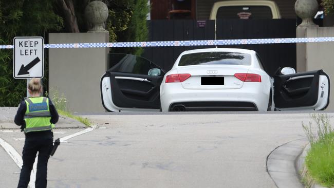 A white Audi at the scene of a shooting in Narre Warren South. Picture: David Crosling