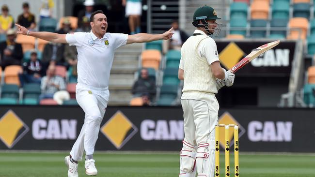 South Africa paceman Kyle Abbott celebrates his wicket of Australia's batsman Adam Voges.