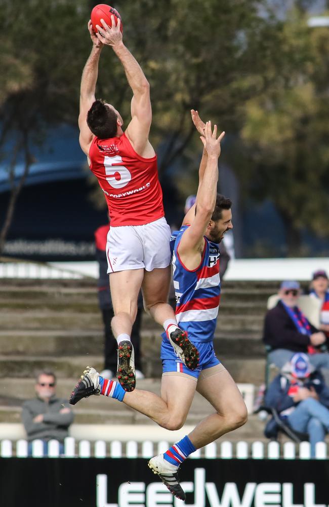 Cameron Craig takes a mark at Prospect Oval on Sunday. Picture: AAP / Russell Millard