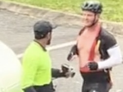 A postman and cyclist have been captured brawling on a suburban street on the Gold Coast in Queensland. Picture: TikTok - https://www.tiktok.com/@joomin554/video/7424367892835093767?is_from_webapp=1&web_id=7412576070127371794