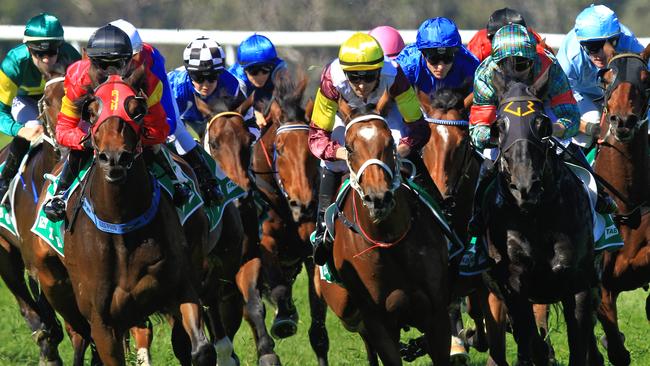 Loving home ridden by Tye Angland  (yellow cap, maroon with yellow armbands) wins race 1 during Scone  Races located in the Upper Hunter Region of NSW. The Bend . Pic Jenny Evans