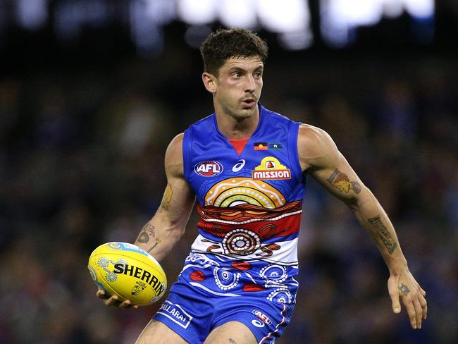 Tom Liberatore’s array of tattoos on his arms.