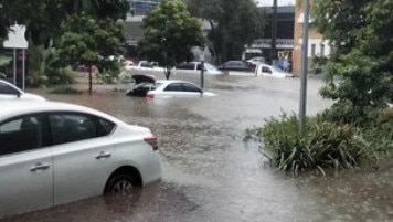 Flooding in West End after a sudden downpour this afternoon. Picture: Facebook