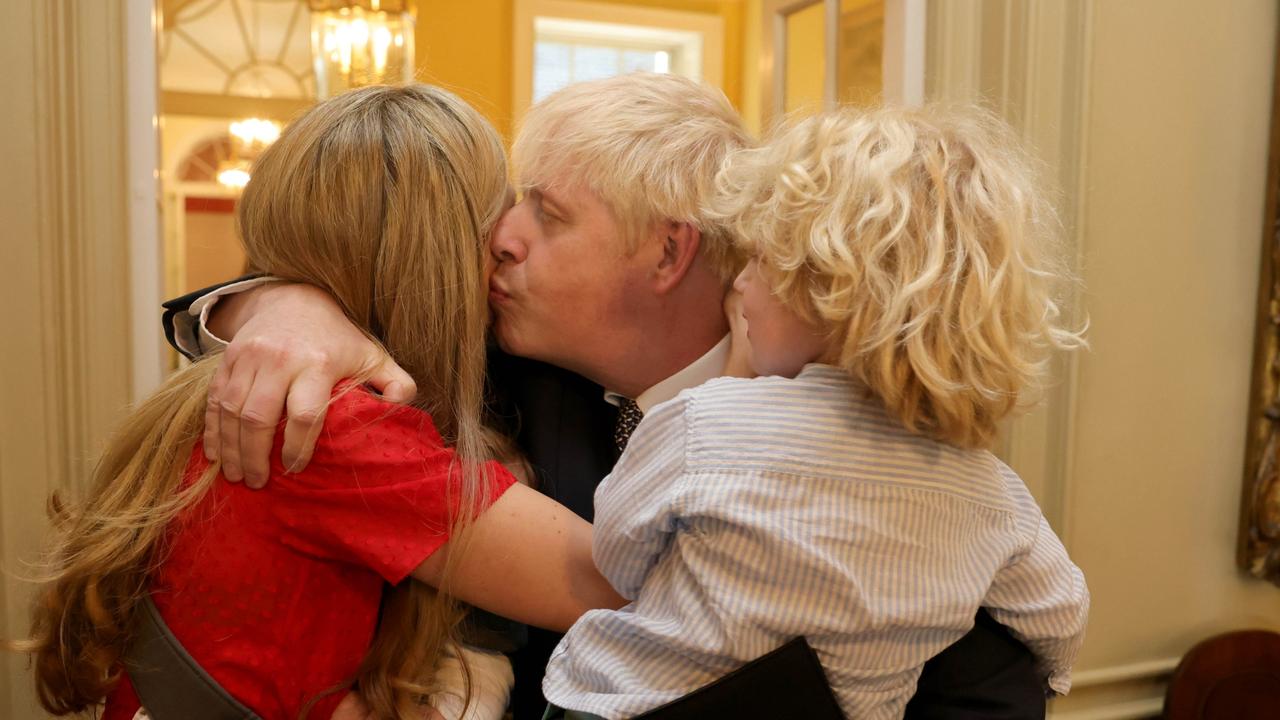 Then UK Prime Minister Boris Johnson is comforted by his wife Carrie and their children after delivering his statement in Downing Street resigning as the leader of the Conservative Party. Picture by Andrew Parsons / No 10 Downing Street