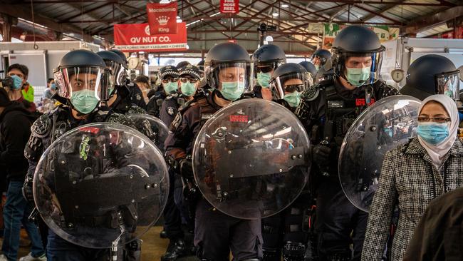 Ugly scenes unfold at Queen Victoria Market on Sunday.