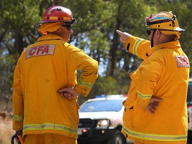 Victorian Country Fire Authority crews are seen preparing to put in containment lines at the Gospers Mountain fire near Colo Heights, north west of Sydney, Wednesday, November 13, 2019. (AAP Image/Dan Himbrechts) NO ARCHIVING