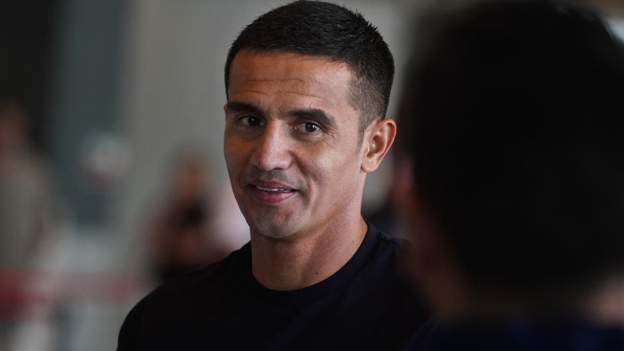 Australian soccer player Tim Cahill speaks to the media