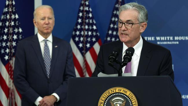 Federal Reserve board chair Jerome Powell speaks as President Joe Biden listens during an announcement last week that Mr Powell has been nominated for a second term in office. Picture: AFP