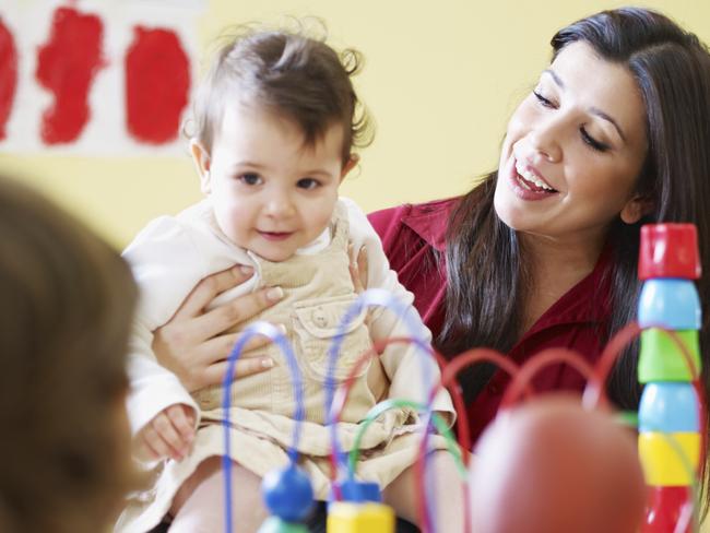 Generic photo of a childcare worker and children in a daycare centre