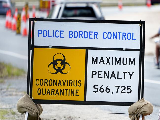 Warning signs of penalties for trying to bypass border controls. Picture: AAP Image/Dave Hunt