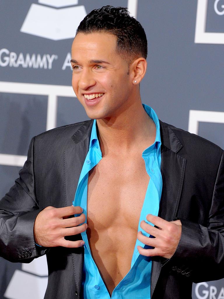 “Oh my, how did that shirt come undone ..?”TV personality Mike ‘The Situation’ Sorrentino attends the 2010 Grammys in Los Angeles. Picture: Getty