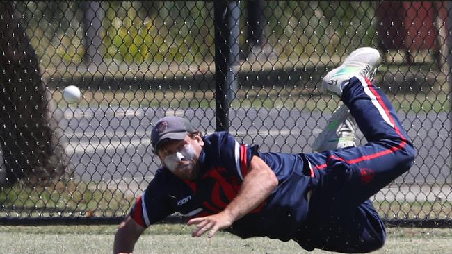 Portarlington's Aaron Toole makes a courageous effort to take a catch. Picture: Alan Barber