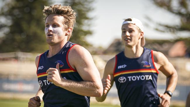 Rory Sloane (left) will feature for Victoria in the Bushfire Relief game. Picture: AAP/Mike Burton