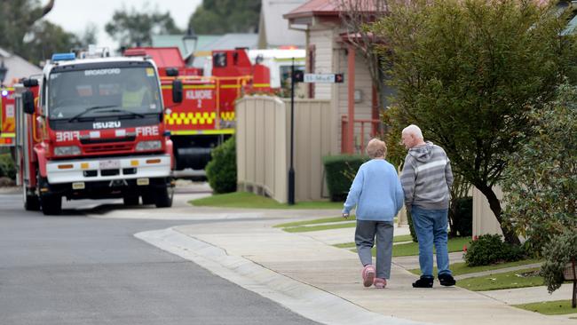 Emergency services crews at the scene of the fatal early morning fire at Kingsgate Retirement Village at Kilmore. Picture: Andrew Henshaw