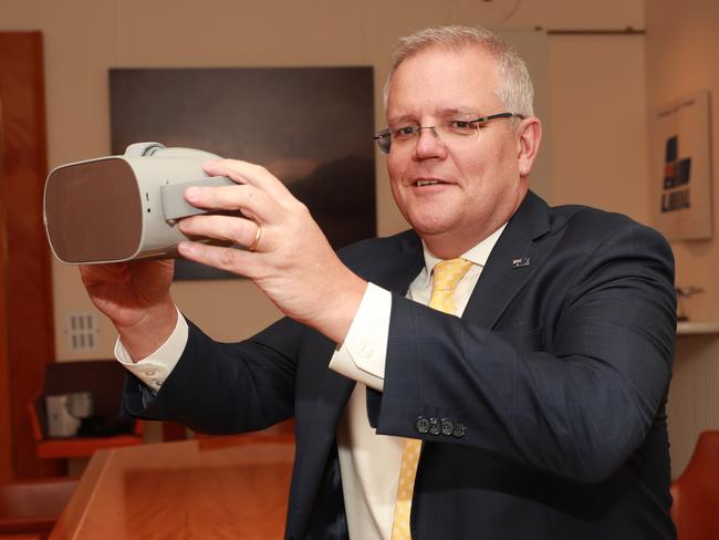 “Brings history to life” ... Prime Minister Scott Morrison reviews the films at his office in Parliament House. He believes they are a great educational tool. Picture: Gary Ramage.