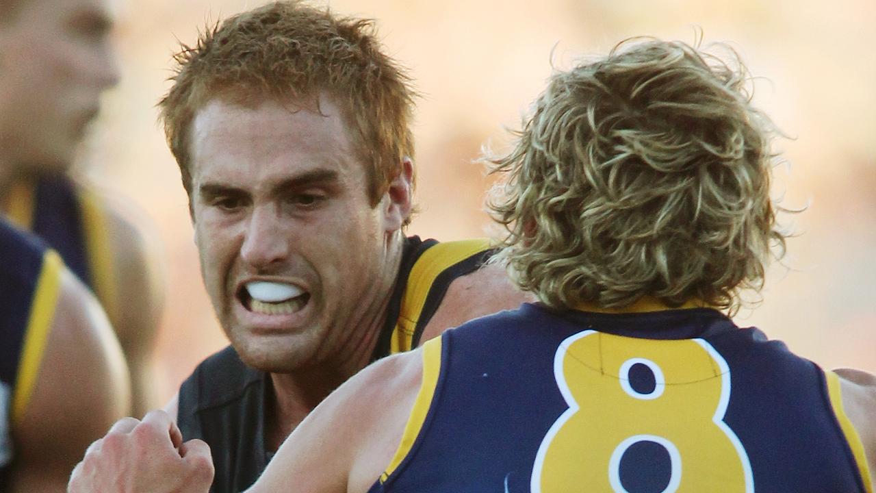 Jackson takes on the Crows during his playing days. Picture: AAP