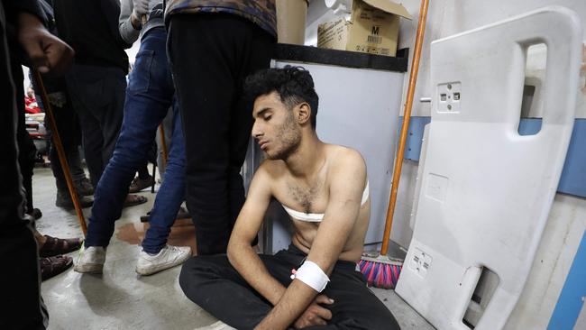 An injured man receives treatment in Gaza City's Al-Shifa hospital, following a reported Israeli strike. Picture: AFP