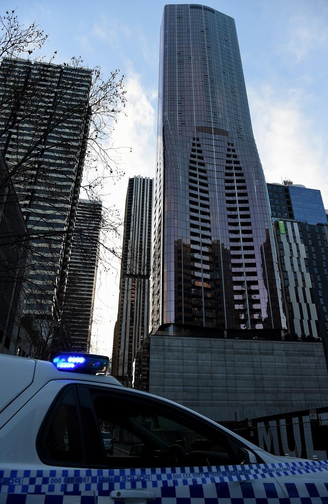 Police investigate after a woman was fatally killed at Eq Tower. Picture: Nicole Garmston