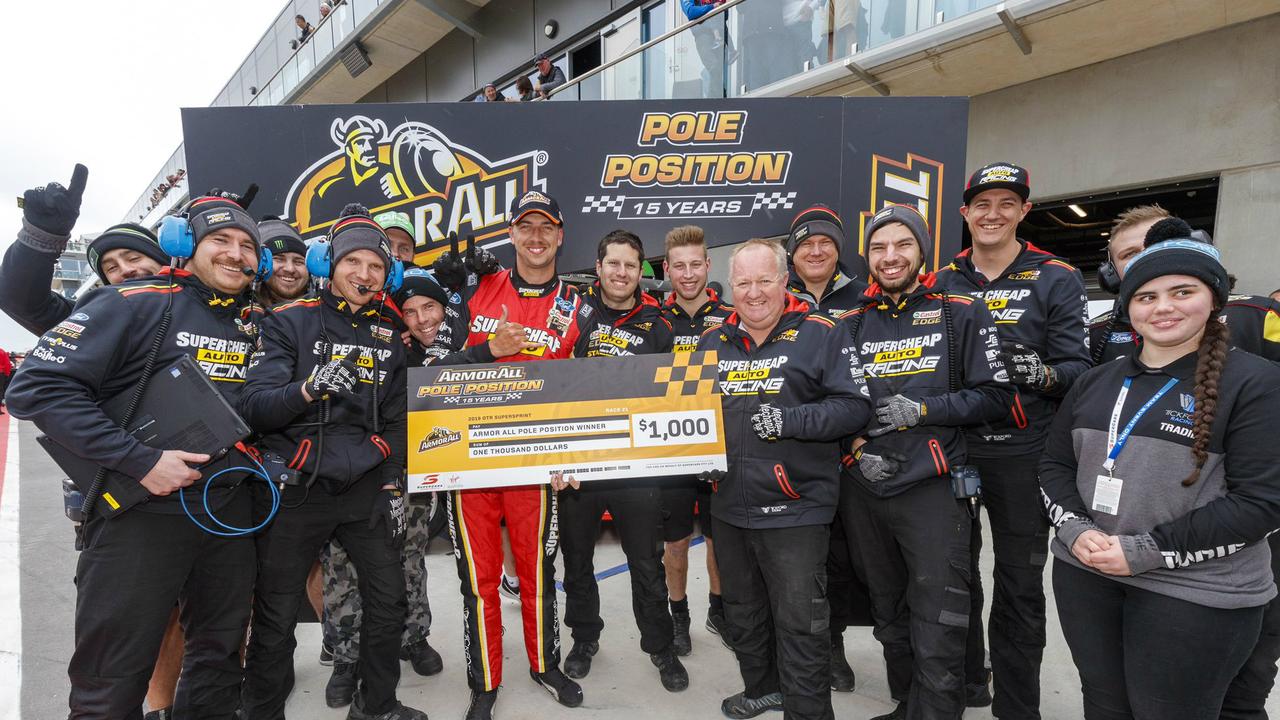 Chaz Mostert celebrates with his crew after taking the Race 21 pole at The Bend.