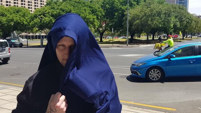 Superannuation scammer Christopher Lloyd George outside the, Adelaide Magistrates Court. Picture: Sean Fewster