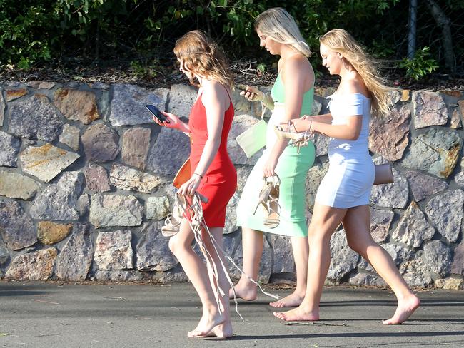 People leaving the Melbourne Cup Day at Eagle Farm. Picture: AAP/Richard Gosling