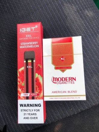 A vape and branded cigarette packet bought from the Berserker Tobacconists. Under the Act, the maximum penalty in court for supplying a smoking object that promotes trademarks, brand names or the manufacturer is $19,299. Vapes also selling nicotine are illegal in Queensland.