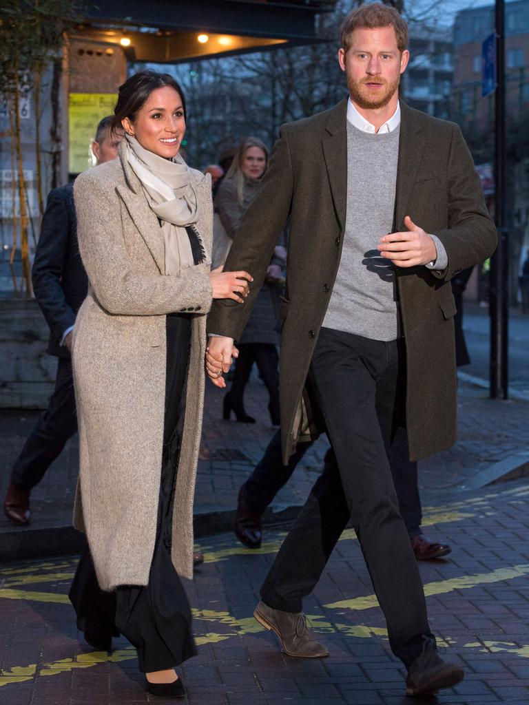 Prince Harry and Meghan Markle leave after visiting Reprezent 107.3FM on January 9, 2018 in London, England. The Reprezent training programme was established in Peckham in 2008, in response to the alarming rise in knife crime, to help young people develop and socialise through radio. Picture: Getty Images