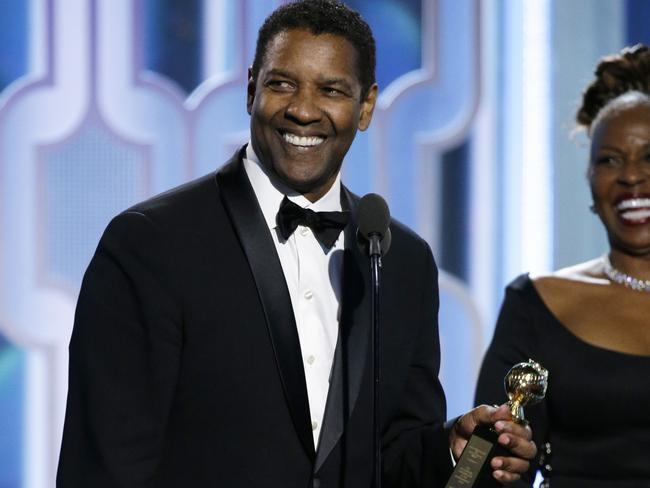 Washington accepts the Cecil B. DeMille Award. (Paul Drinkwater/NBC via AP)