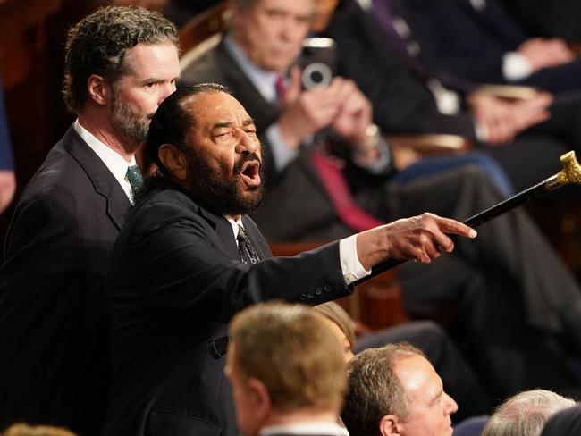 US Representative Al Green (D-TX) (L) disrupts US President Donald Trump  as he addressed to a joint session of Congress at the US Capitol in Washington, DC, on March 4, 2025. (Photo by ALLISON ROBBERT / AFP)