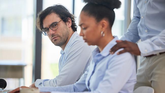 istock generic:  woman, abuse, DV, domestic violence, harassment, sexual harassment.   Sexual harassment, inappropriate sensual work behavior with a woman worker and man seeing a crime. Business employee with fear of a ceo corporate management leader while working in a company office . Picture: istock