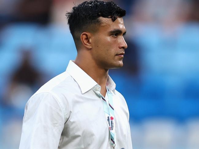 SYDNEY, AUSTRALIA - FEBRUARY 28: Injured Waratah player Joseph Suaalii watches team mates warm up during the round three Super Rugby Pacific match between NSW Waratahs and Fijian Drua at Allianz Stadium, on February 28, 2025, in Sydney, Australia. (Photo by Cameron Spencer/Getty Images)