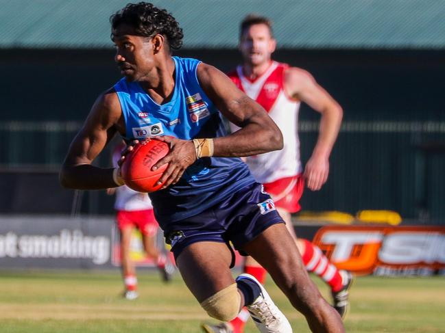 Rovers' Tosh Kunoth sets his sights on the goals on the way to booting six against Federal on Saturday. Picture: Charlie Rowson