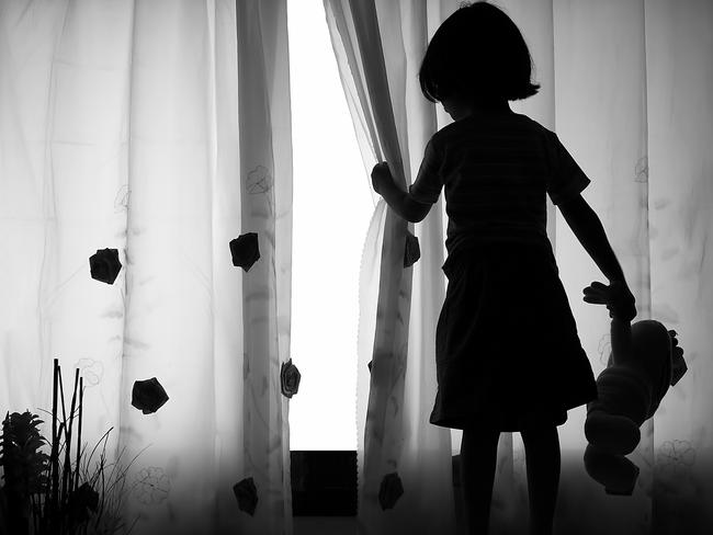 Lonely girl with Doll - Silhouette. scared. child abuse. Picture: iStock.