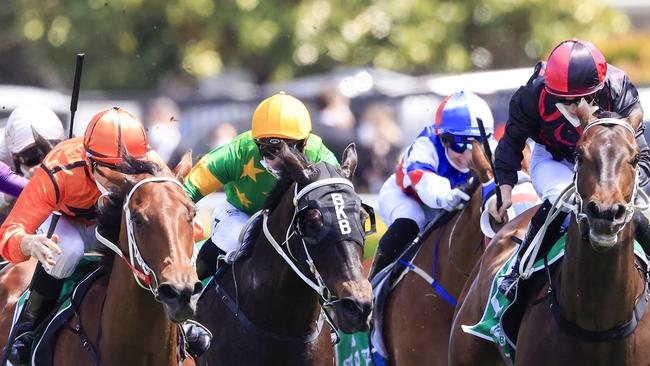 Blow Dart (yellow cap) was a solid third behind Ten Bells last start. Picture: Getty Images