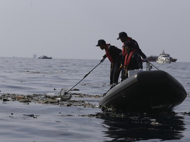 Rescuers pictured in 2018 conducting a search operation after a Boeing MAX 8 jet owned by Lion Air crashed into the ocean. Picture: AP