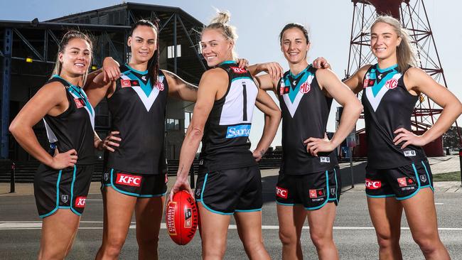 ADELAIDE, AUSTRALIA – AUGUST 01: Inaugural AFLW Port Captain Erin Phillips with her leadership group. Justine Mules, Gemma Houghton, Vice Captain Ange Foley and Hannah Dunn poses during a Port Adelaide Power AFLW media opportunity on August 01, 2022 in Adelaide, Australia. (Photo by Sarah Reed/Getty Images)