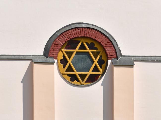 Wall and window of the synagogue building