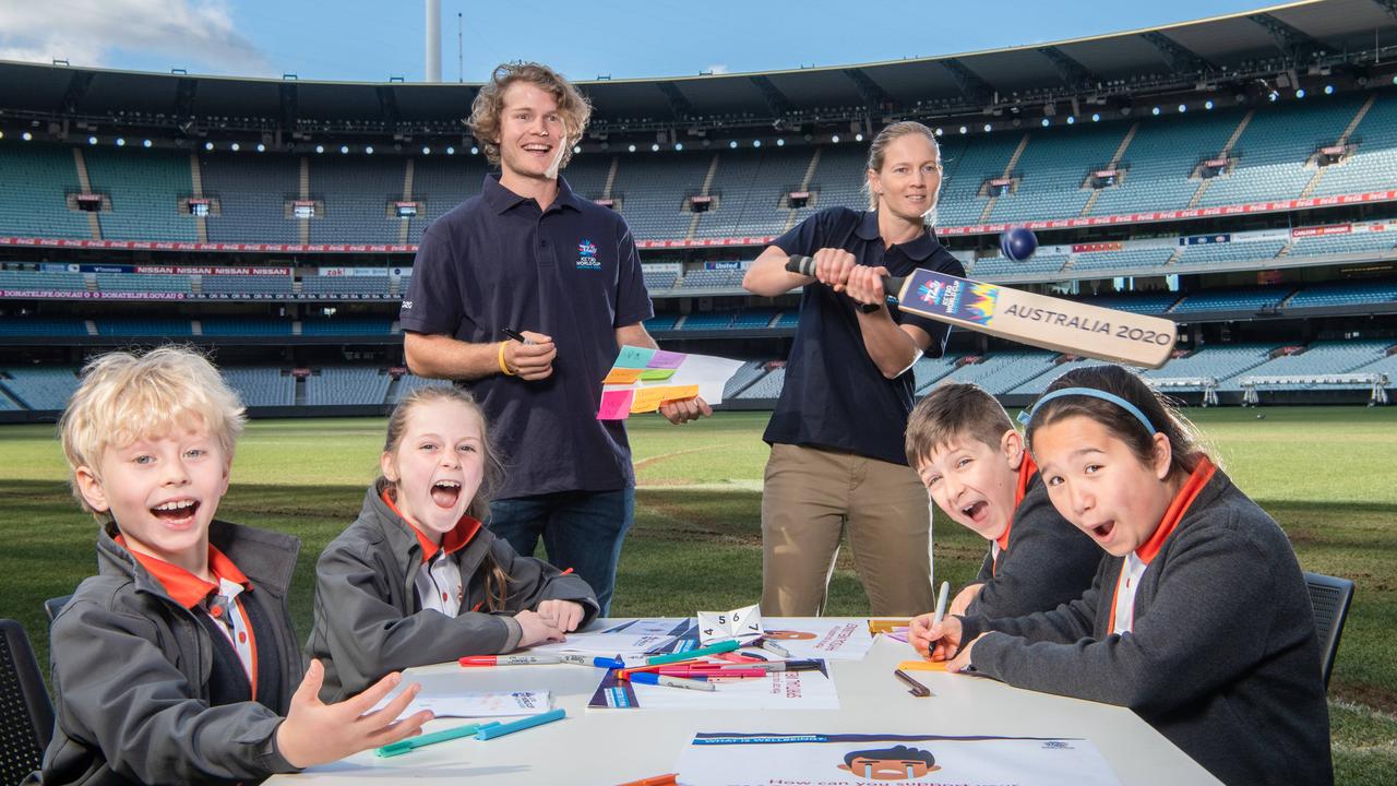 Luke, 7, Mieka, 8, Vlad, 9 and Mia, 10 from South Melbourne Park Primary School with cricketers Will Pucovski and Meg Lanning at the MCG. Picture: Jason Edwards