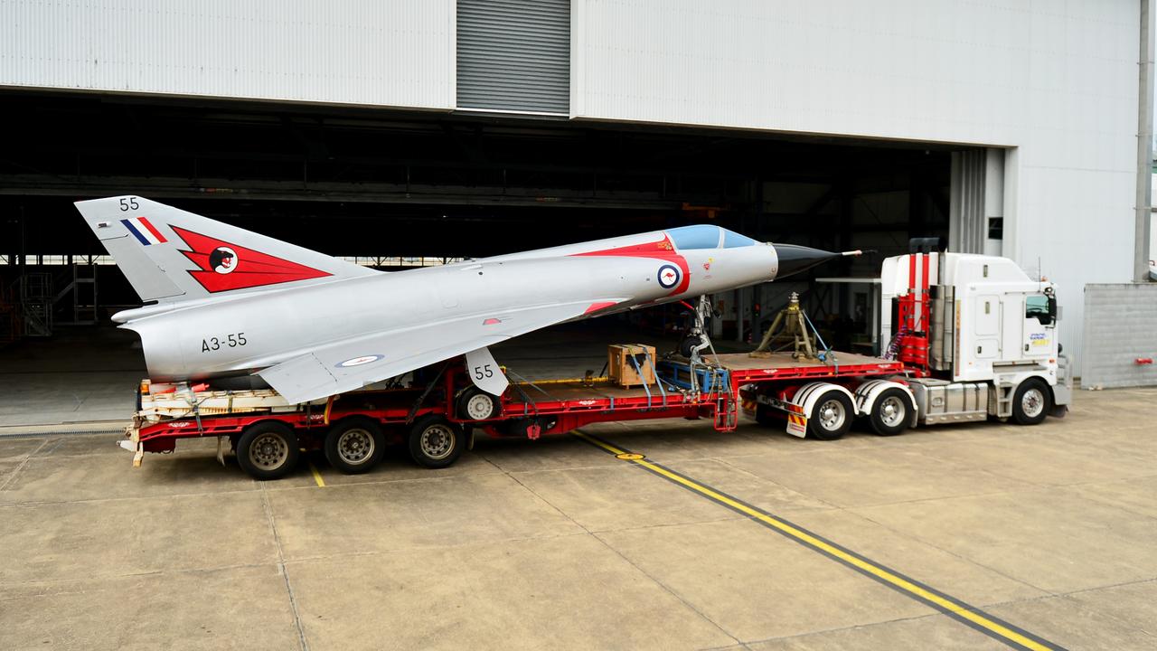 Two restored Royal Australian Air Force aircraft veterans- a Mirage fighter jet A3-55 and a Winjeel Trainer??? A85-403 - arrived at Townsville RAAF Base. Picture: Alix Sweeney