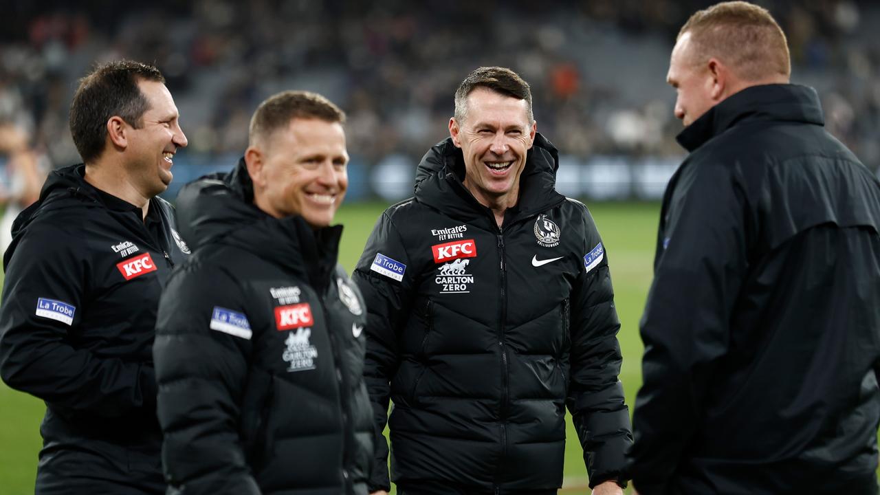 Hayden Skipworth, Brendon Bolton, Craig McRae and Justin Leppitsch – the Magpies’ coaching panel. Picture: Michael Willson/AFL Photos via Getty Images